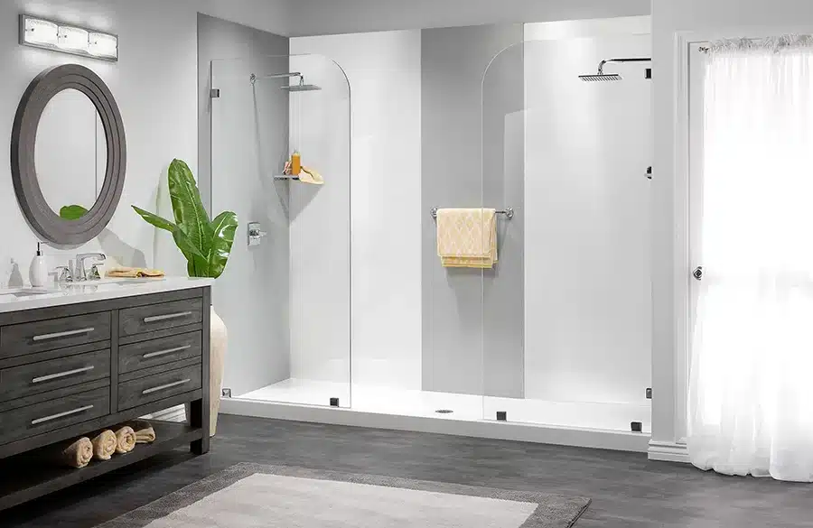 Double shower heads in a modern bathroom remodeled by Earl's Plumbing in Lubbock, TX