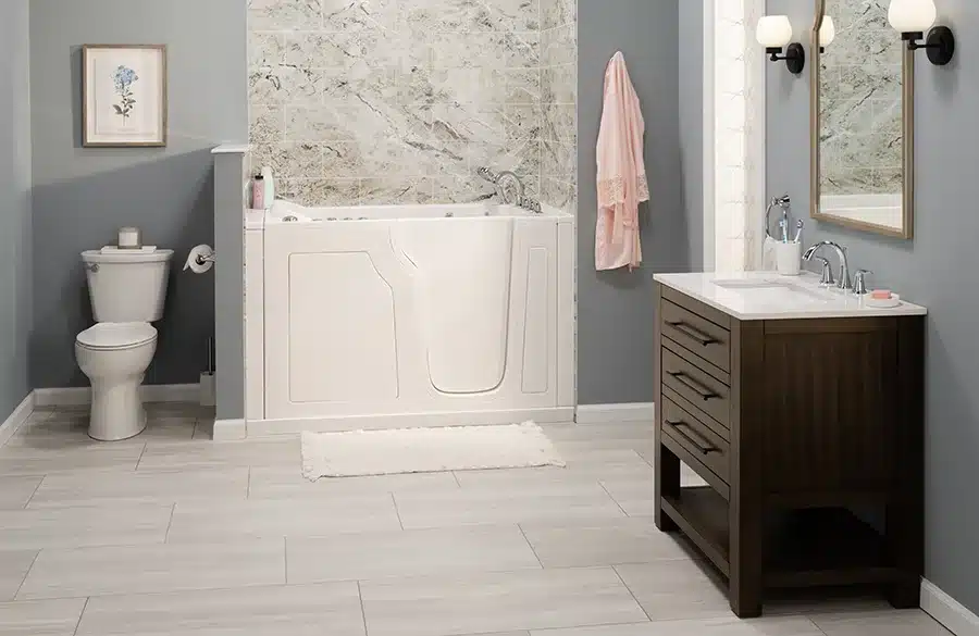 Walk in tub in a modern bathroom remodeled by Earl's Plumbing in Lubbock, TX